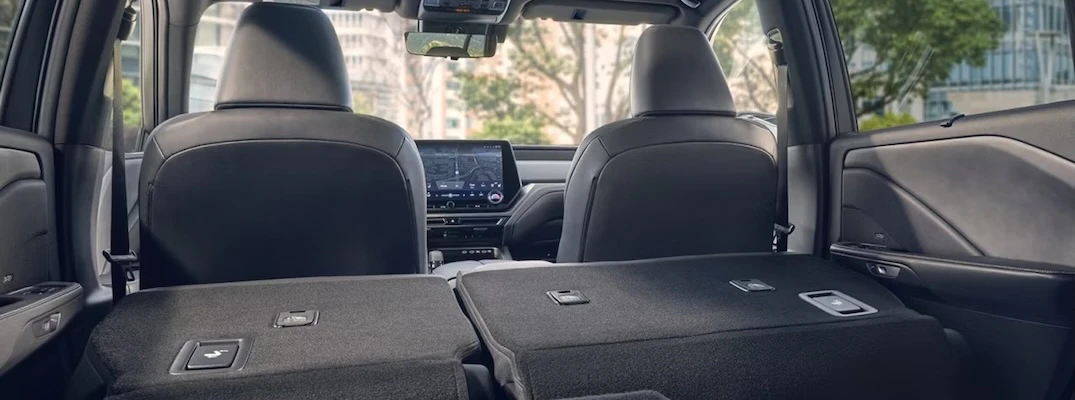 An interior view of the 2026 Lexus TX with the rear seats folded down.